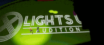 .GIF of Mayday (No Straight Roads game) yelling and pointing at the camera, then fade-blink to black